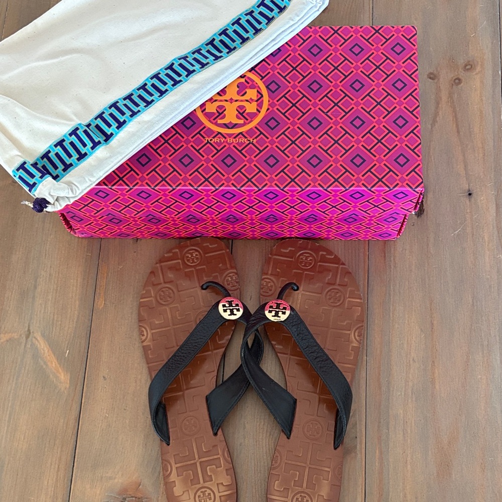 Tory Burch Thora Black Leather Flip Flops with Brown Soles and Gold Logo